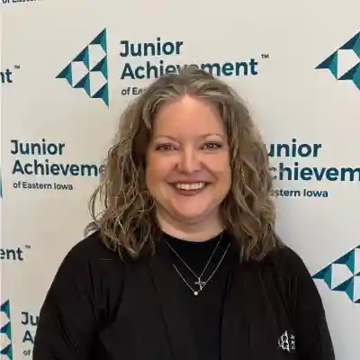 Image of a woman wearing a black shirt