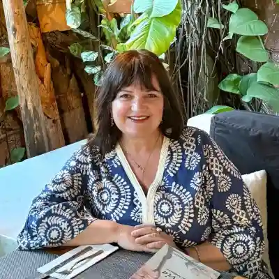 Image of a woman in a blue shirt