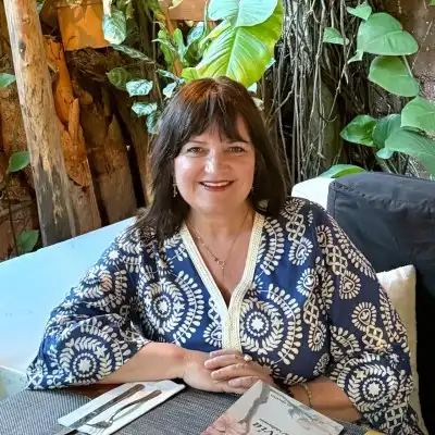 Image of a woman in a blue shirt