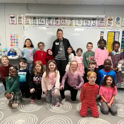 Volunteer with a group of students