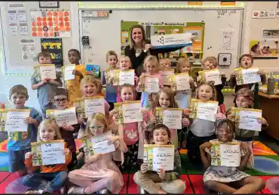photo of a group of students and a volunteer