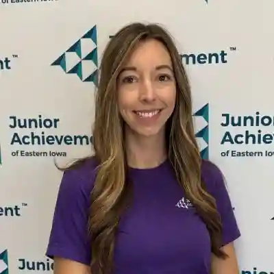 Image of a woman in purple shirt