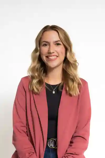 Photo of a woman wearing a red jacket
