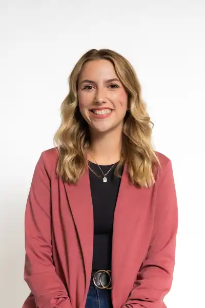 Photo of a woman wearing a red jacket
