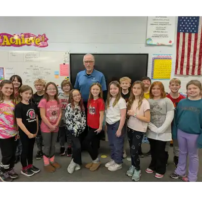 image of a group of students with volunteer