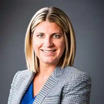 Image of a woman in grey jacket