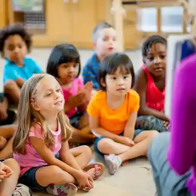 teacher and students looking at a monitor