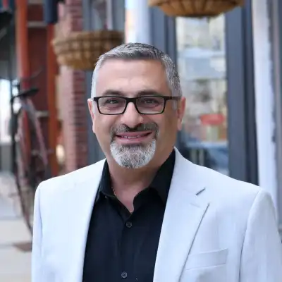 Image of a man in white jacket