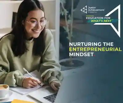 Image of two male student working on an ipad