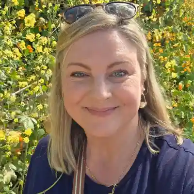 Image of a woman with yellow flowers in the background